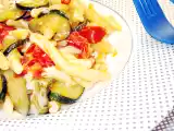 Ricetta Strozzapreti con pancetta, pomodorini, zucchine e scamorza