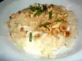 Ricetta Risotto mantecato con crescenza e nocciole