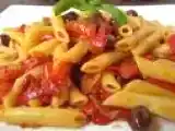 Ricetta Penne con melanzane, peperoni e salsiccia