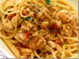 Ricetta Spaghetti pesce spada e gamberetti al pistacchio.