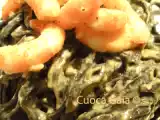 Ricetta Tagliolini al nero di seppia con gamberi e curry