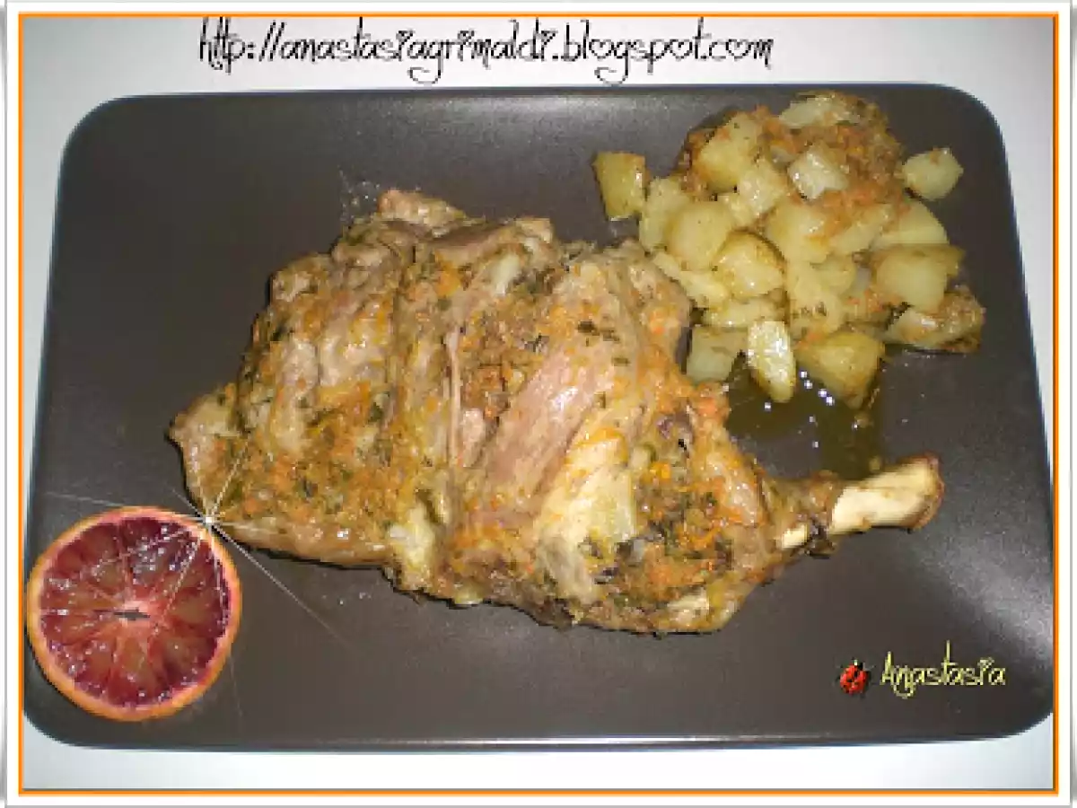 Cosciotto di agnello in gremolada all'arancia con patate al forno