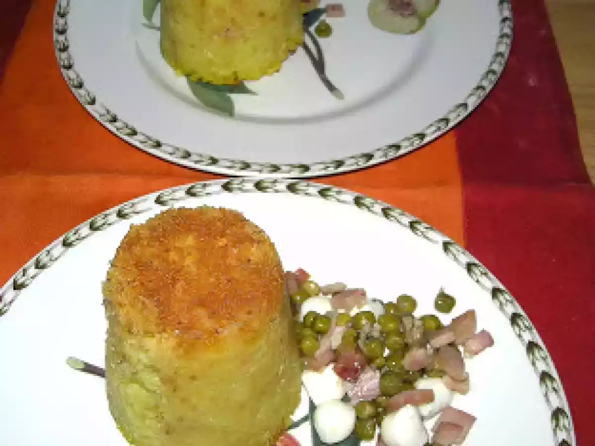 Timballini di riso con prosciutto e piselli